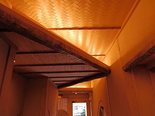 A ceiling and the indirect lighting that a step arranged
