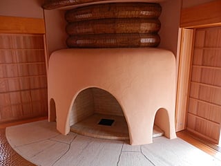 Fireplace of the plastering finish
