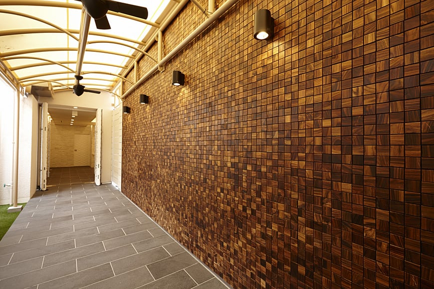 Outside passage. Wall surface of mosaic Wood